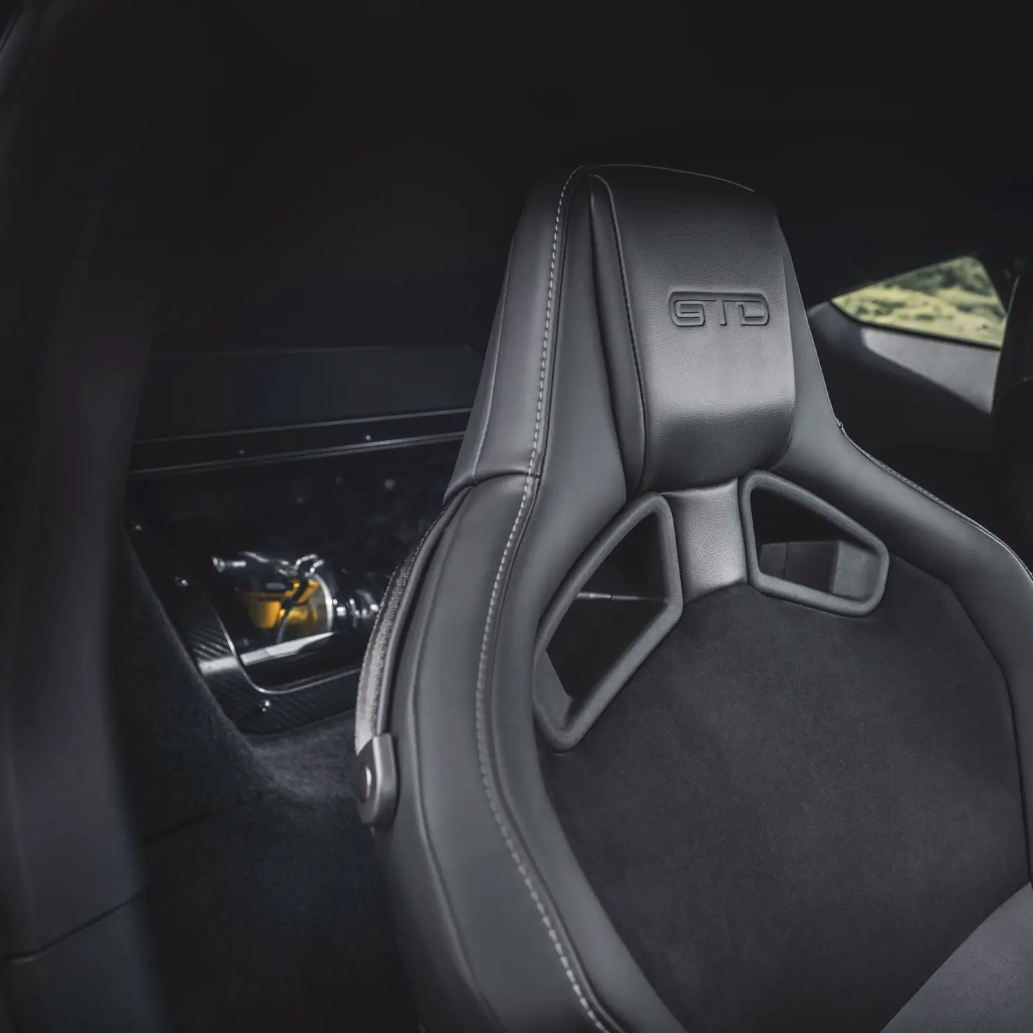 Rear Engine peek transparent window in the cockpit of the 2025 Ford Mustang GTD