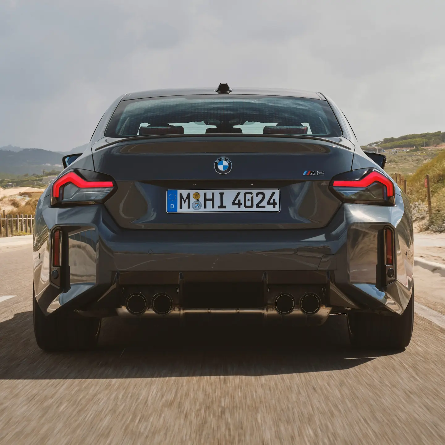 Rear View of the BMW M2 2025 on the road