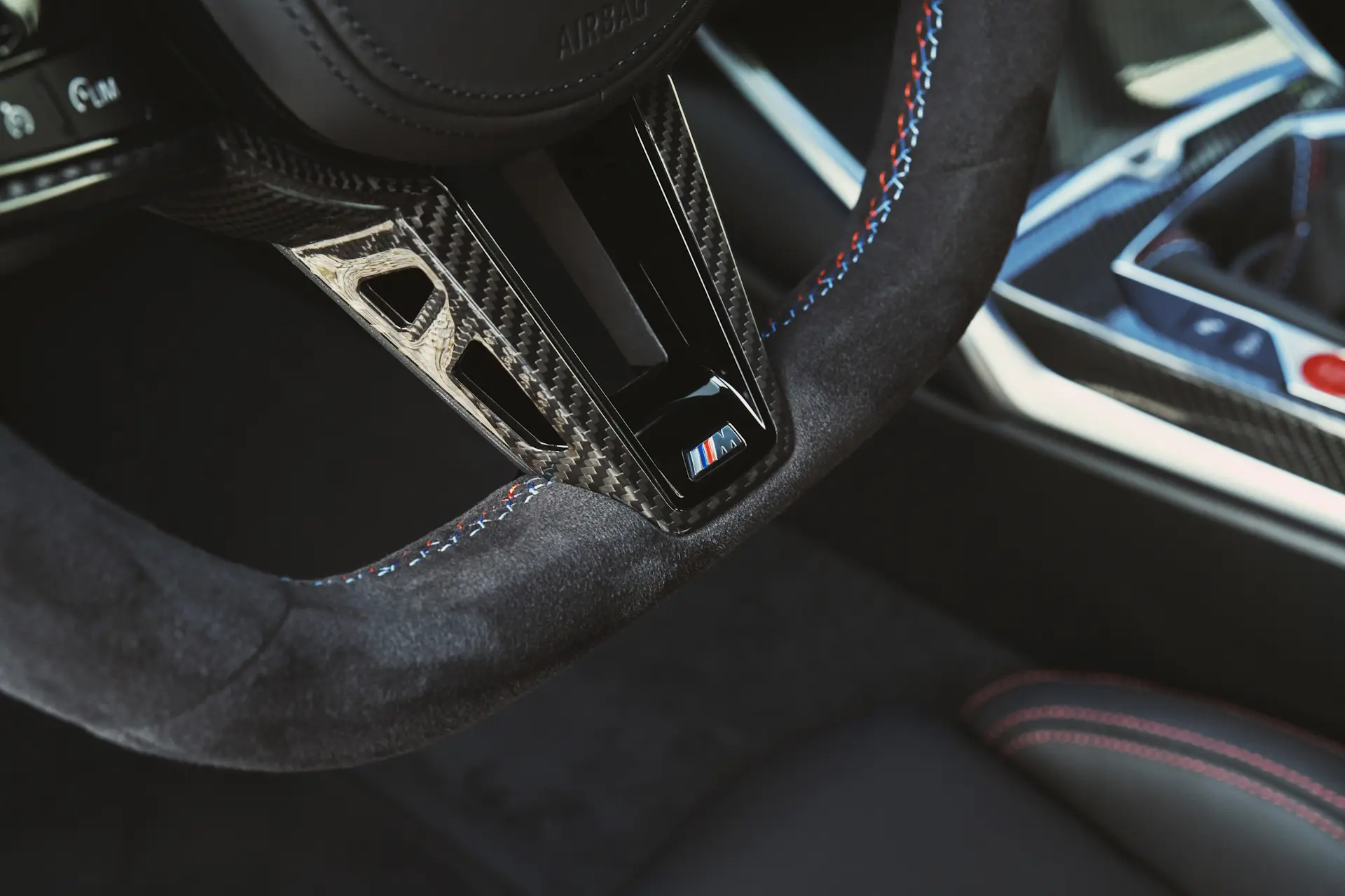 M-Badge on the steering wheel in the BMW M2 2025