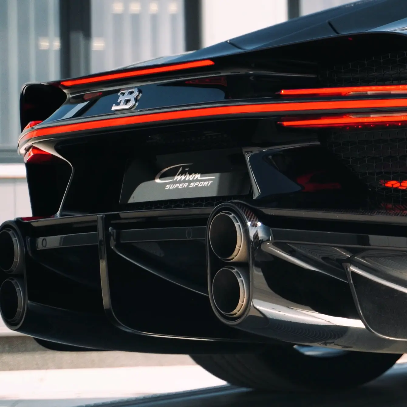 Rear Section of a Black Bugatti Chiron Super Sport: Diffuser, Exhaust and Tail Aero