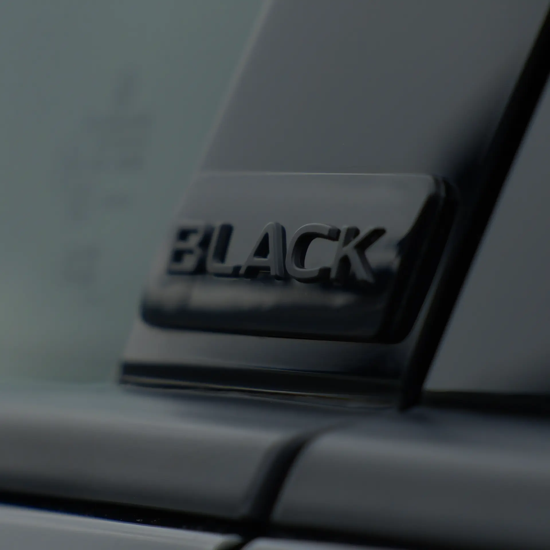 BLACK badge on door