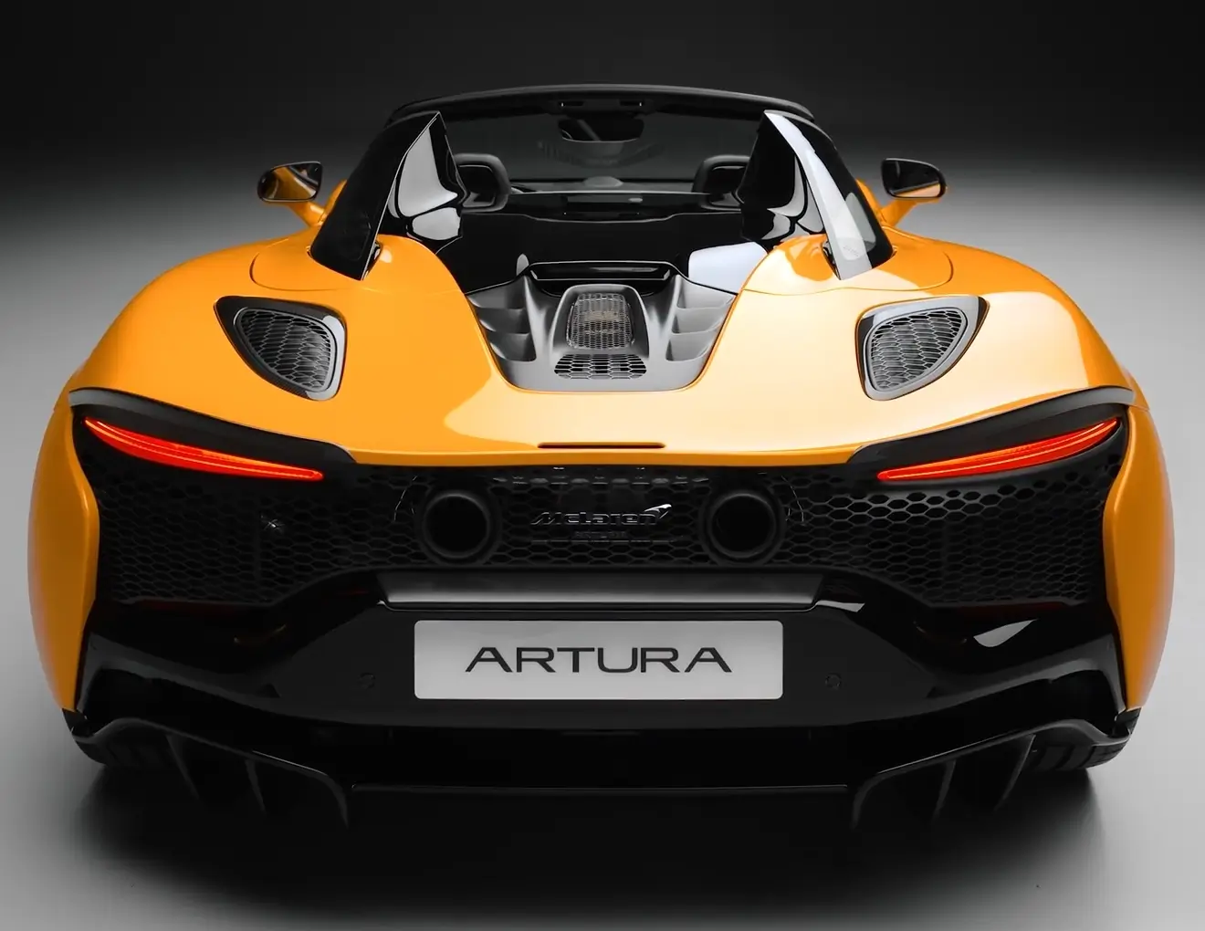 Rear View of an Orange McLaren Artura Spider