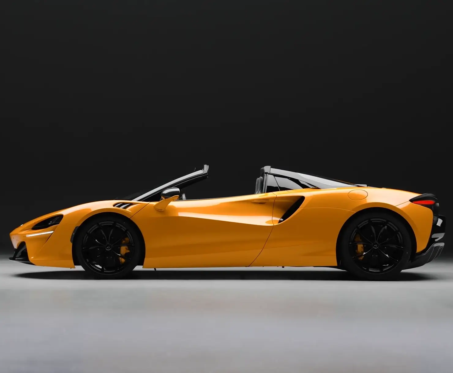 Profile View of on Orange McLaren Artura Spider