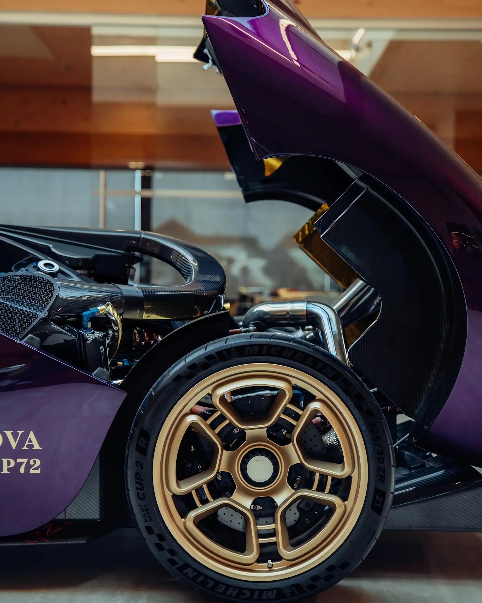 Close Up of Copper Wheel Rims and Engine Bay (more gold finish in there)